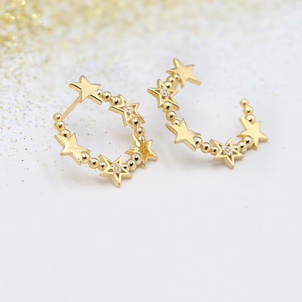Astral Σκουλαρίκια με αστεράκια και λευκές πέτρες